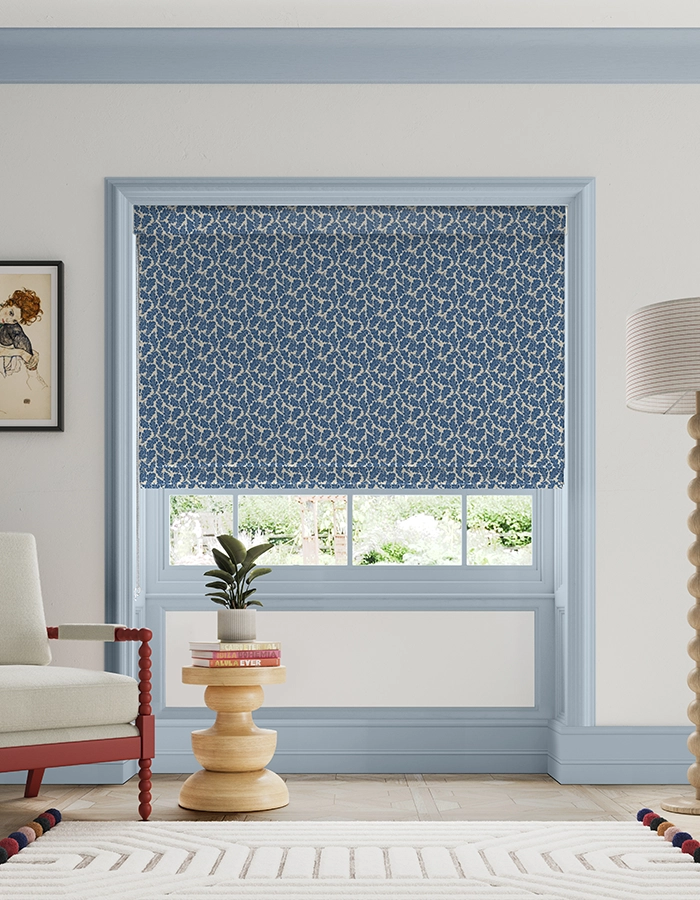 Room with blue leaf roman blind from Land & Shore