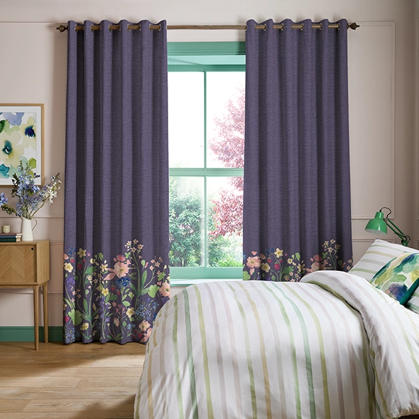 Bedroom with purple flower design curtains from Bluebellgray collection