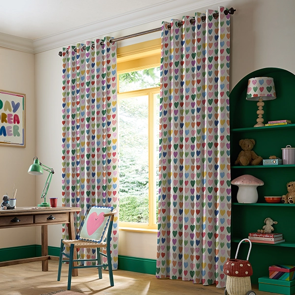 Room with colourful hearts design curtains from Wee Blue Bell collection