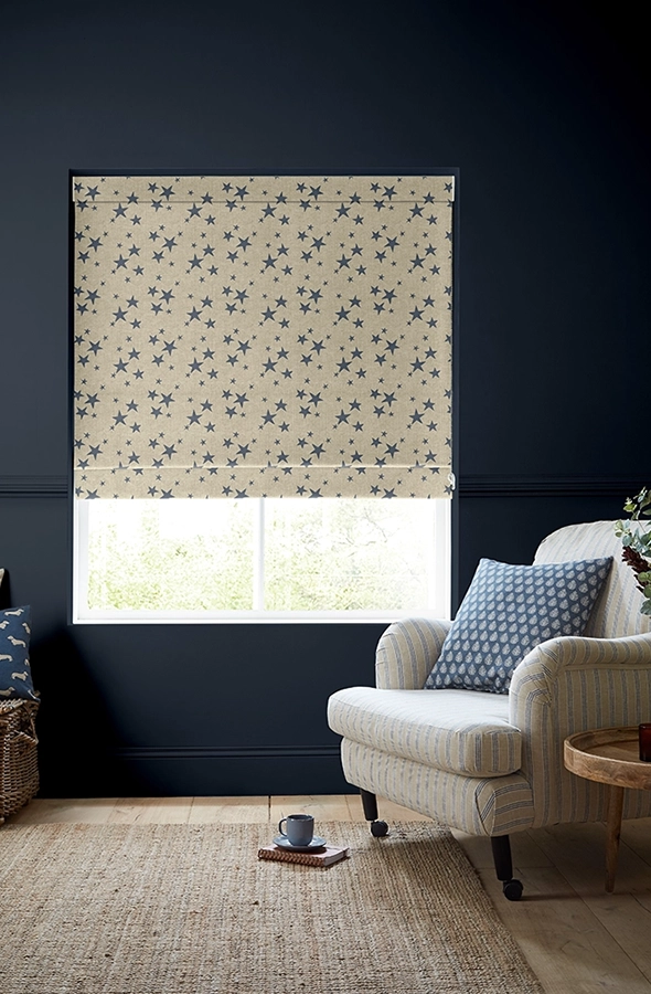 Room with purple star design roman blind form Emily Bond