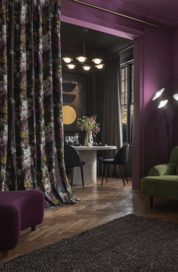 Room with flower navy curtains from Graham & Brown