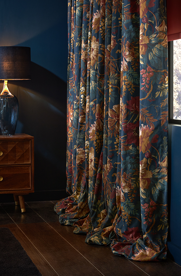 Room with dark floral curtains from Graham & Brown