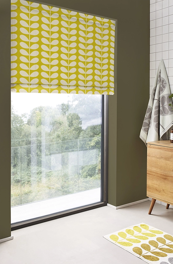 Room with yellow geometric design roman blind form Orla Kiely