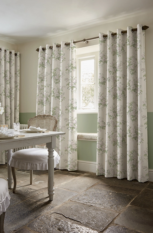 Room with natural floral curtains by Shabby Chic by Rachel Ashwell
