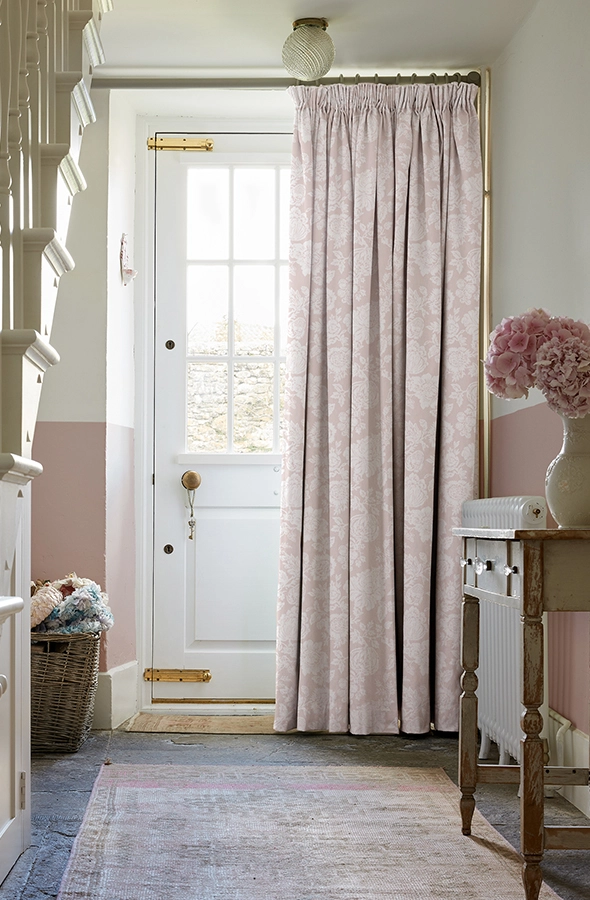 Room with white flowers against neutral background curtain by Shabby Chic by Rachel Ashwell