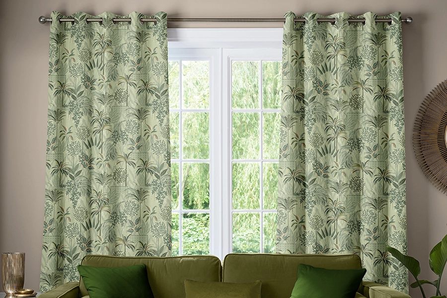 Room with green floral curtains form Sara Miller