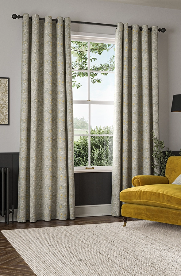 Room with eyelet curtains from William Morris at Home