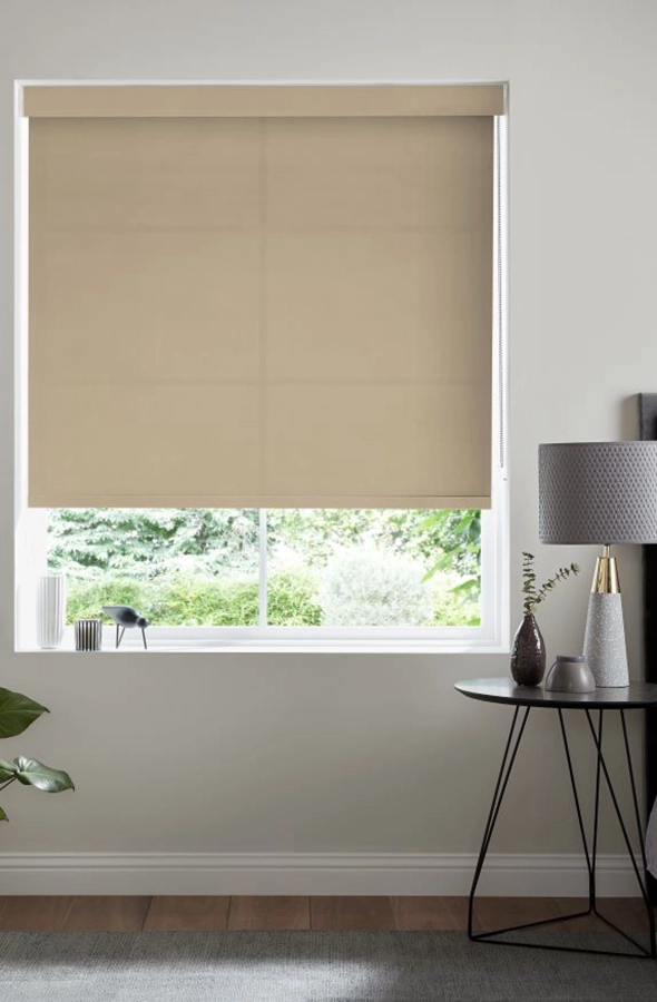Room with beige roller blind from illumin8 Rollers Collection