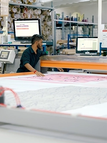 Workers operating the factory system