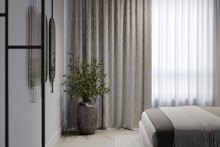 Grey geometric curtains and white sheer curtains from illumin8 in bedroom